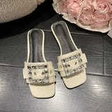 LOURDASPREC- Summer sandals with metal button and letter decoration